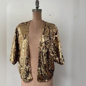 Carolina Herrera Good Girl gold sequin top